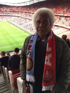 James Wini soaks in the atmosphere at the Emirates Stadium